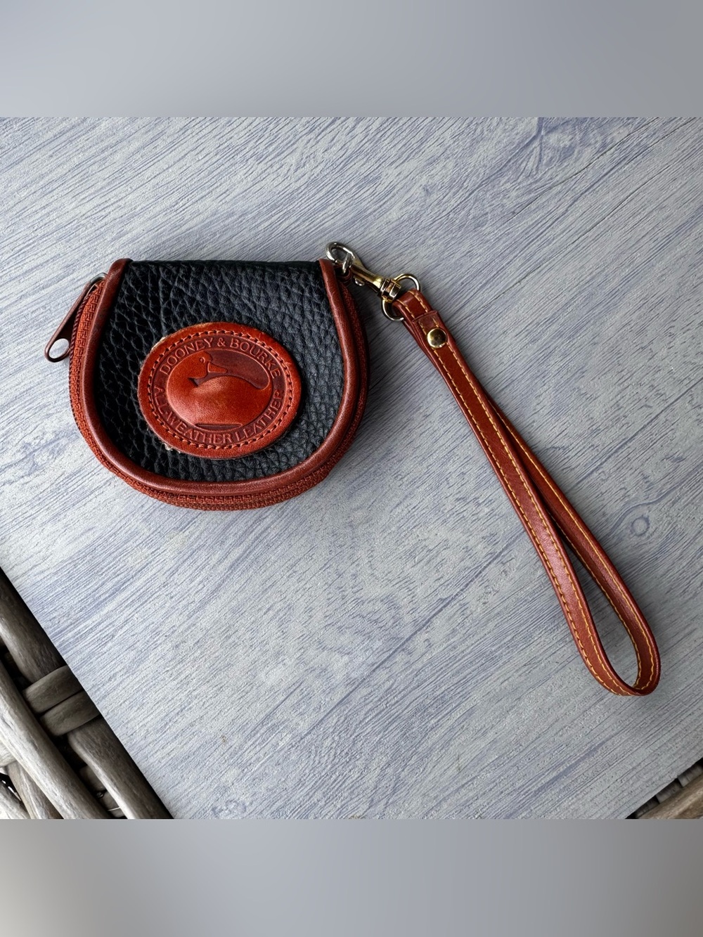 Dooney & Bourke Black Pebbled Leather Mini Wristlet with Brown Trim
